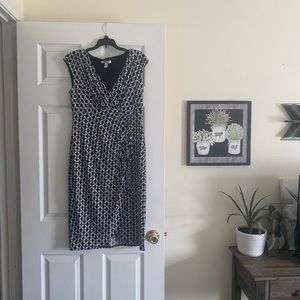 Very sexy dress has wrap around style to it.